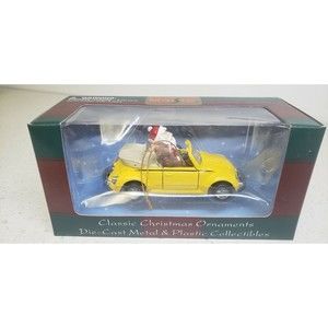 NIB - Vintage 1999 Maisto Die Cast Yellow VW Bug Car with Santa and a Rudolf